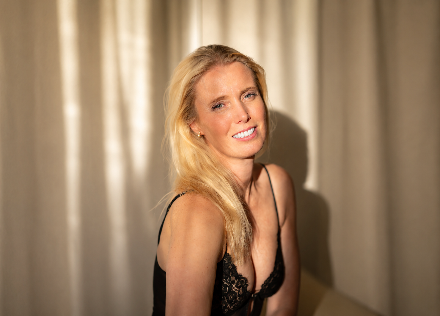 Blonde woman in black lace.