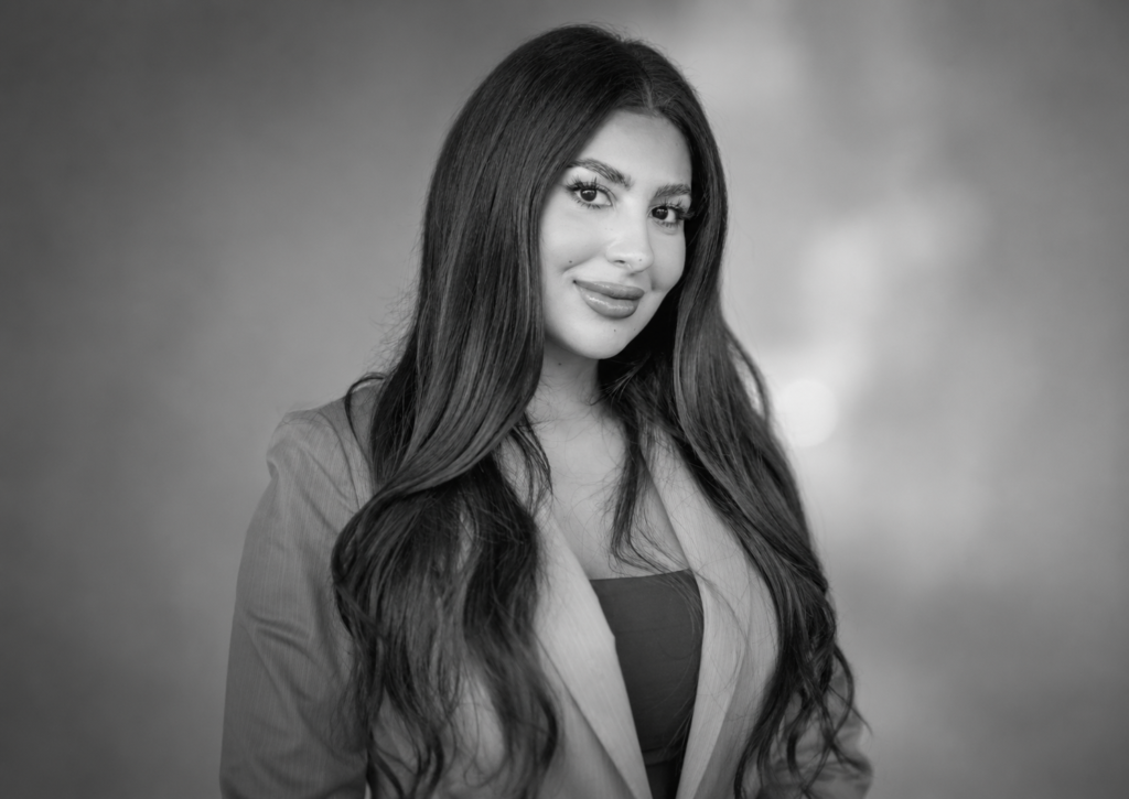Woman in blazer portrait.