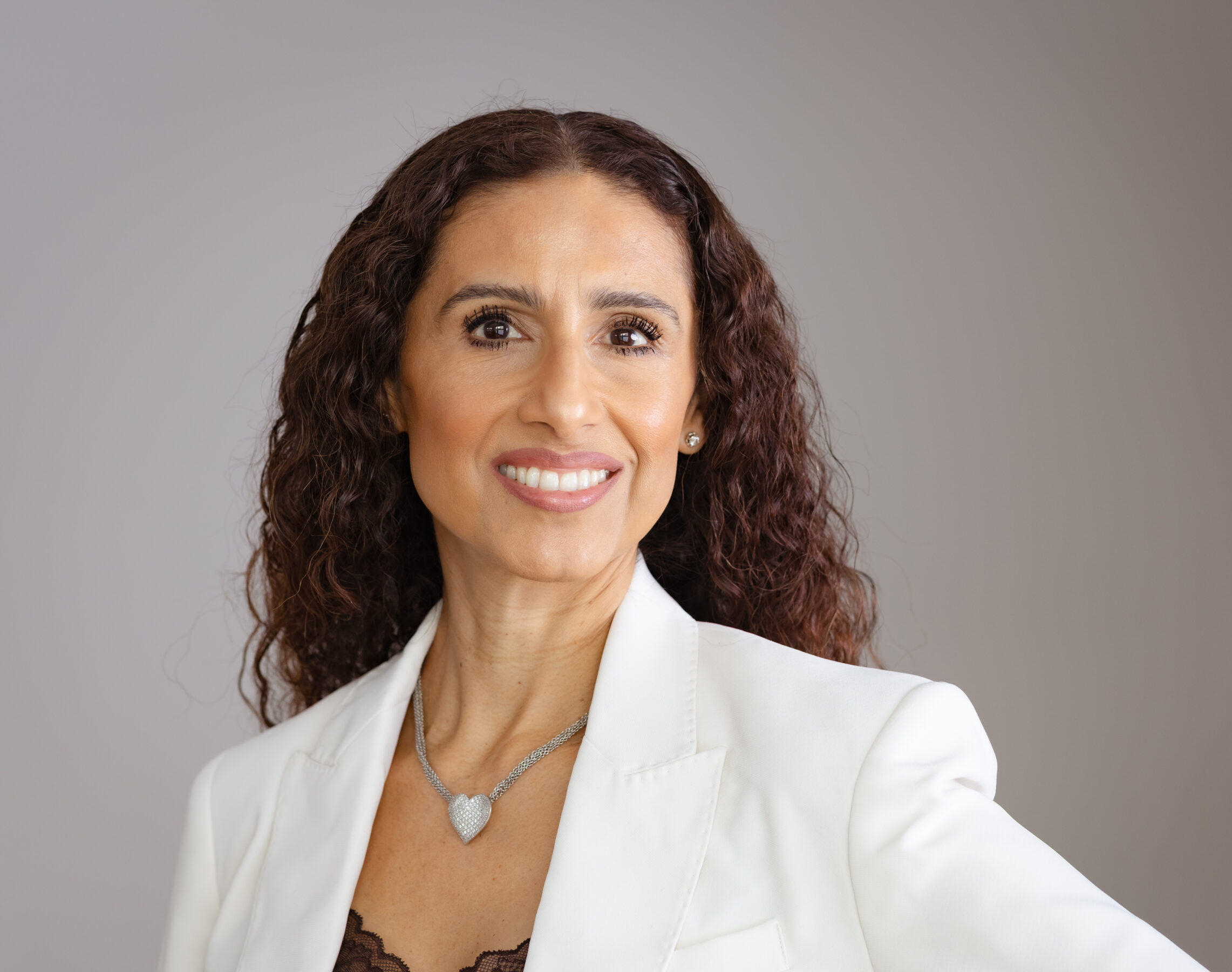 Professional woman in blazer.